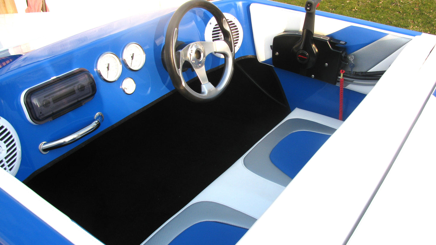White and blue speed boat